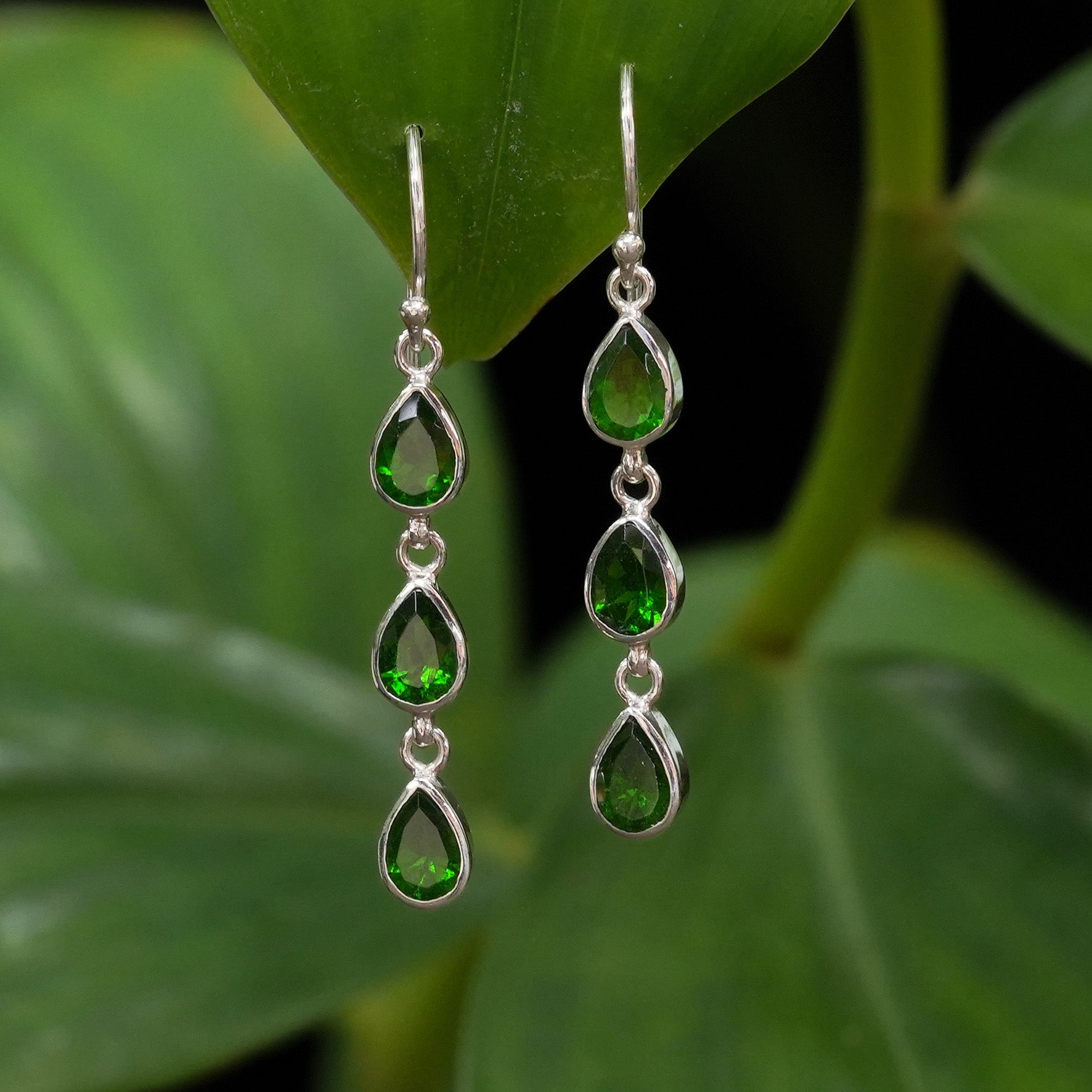 Alternate front‑facing image of the same chrome diopside 3‑stone drop earrings, showing the earrings hanging freely and aligned from top to bottom.