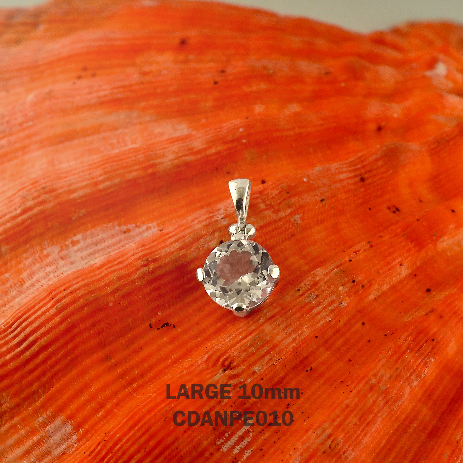 Starborn Danburite Round Faceted Pendant in Sterling Silver