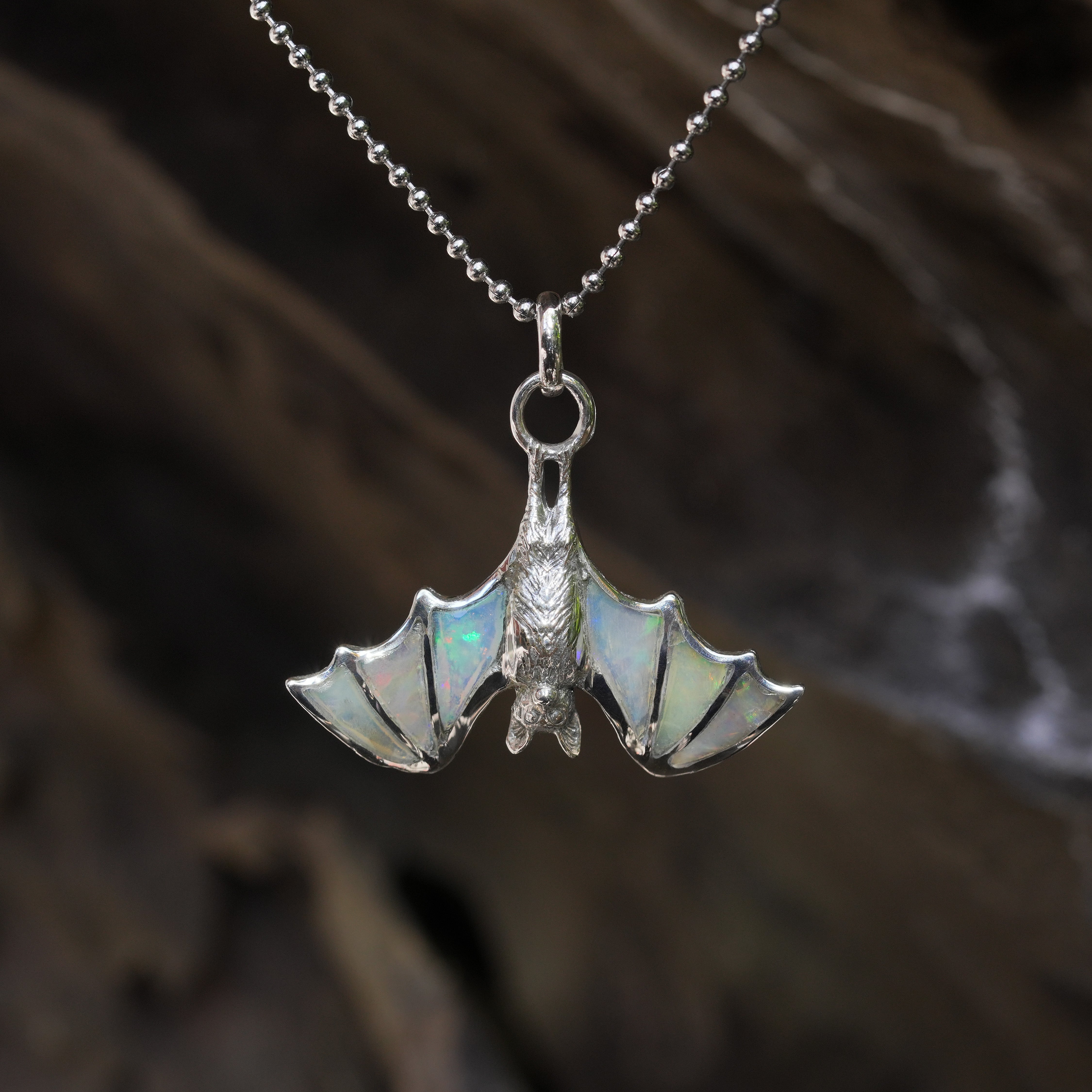 Starborn Natural Ethiopian Opal Hanging Bat Pendant in Sterling Silver