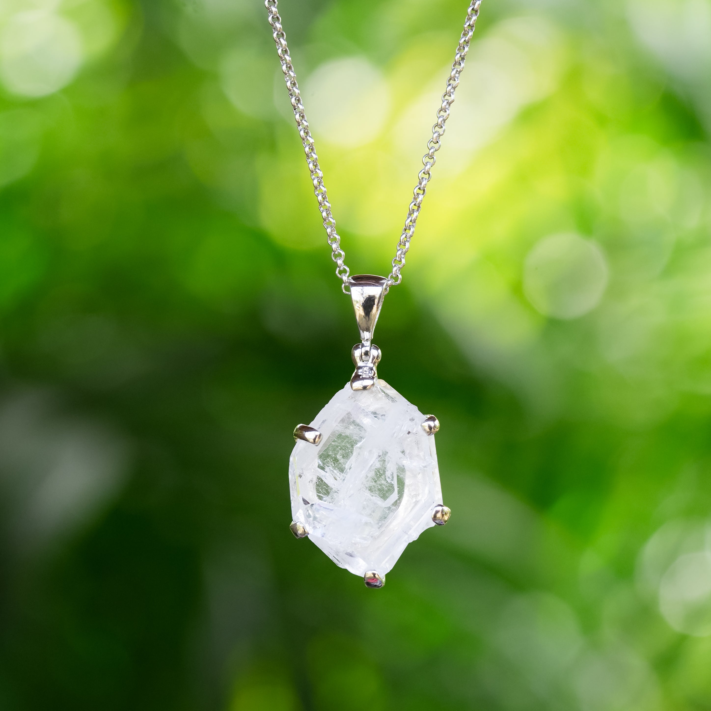 Starborn Faden Quartz Crystal Prong Set Pendant in Fine Sterling Silver