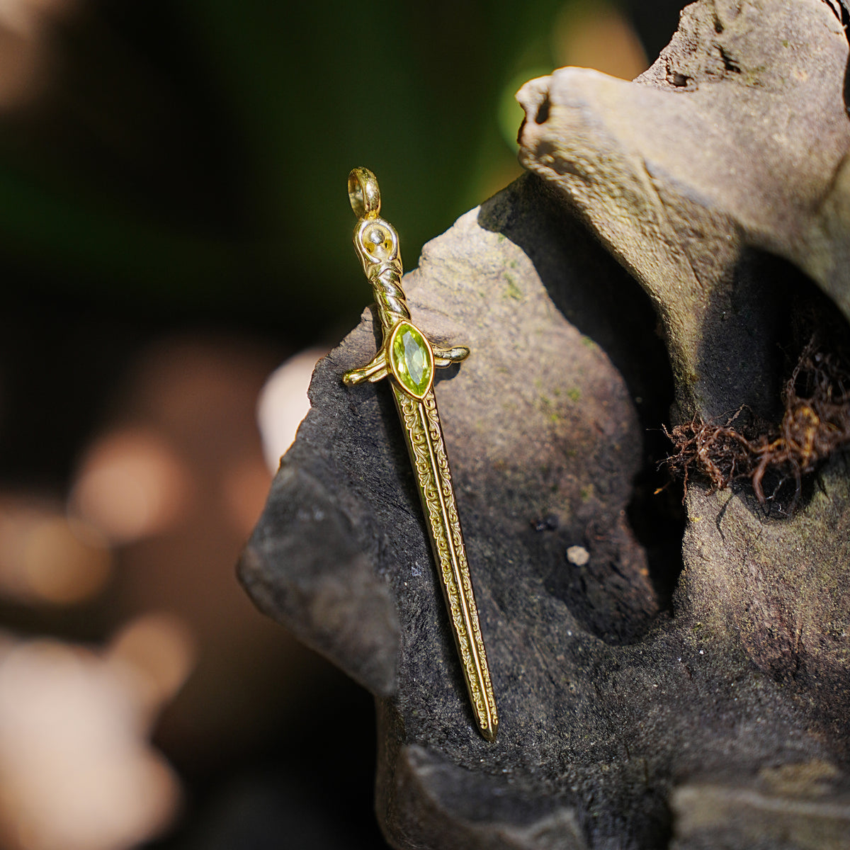 Starborn Peridot Sword Pendant