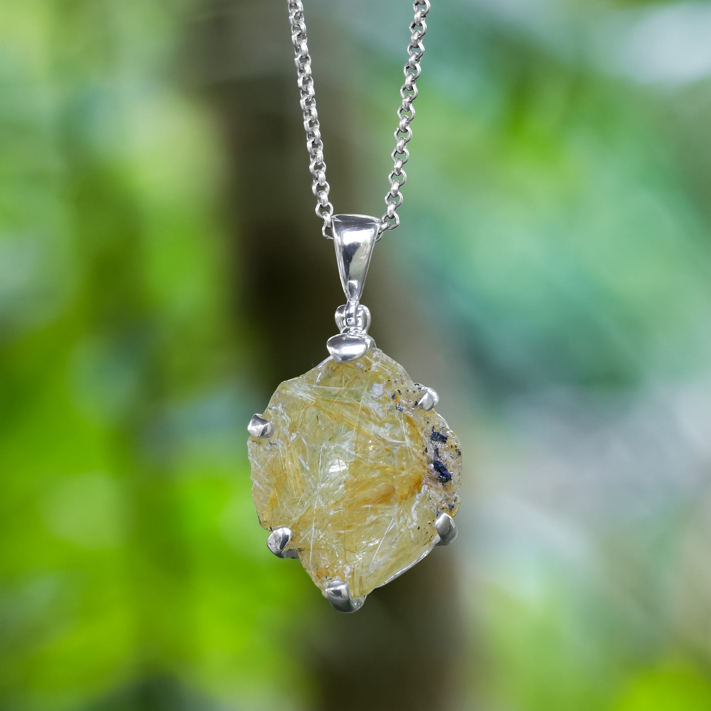 Starborn Rutilated Quartz Prong Set Pendant in Sterling Silver