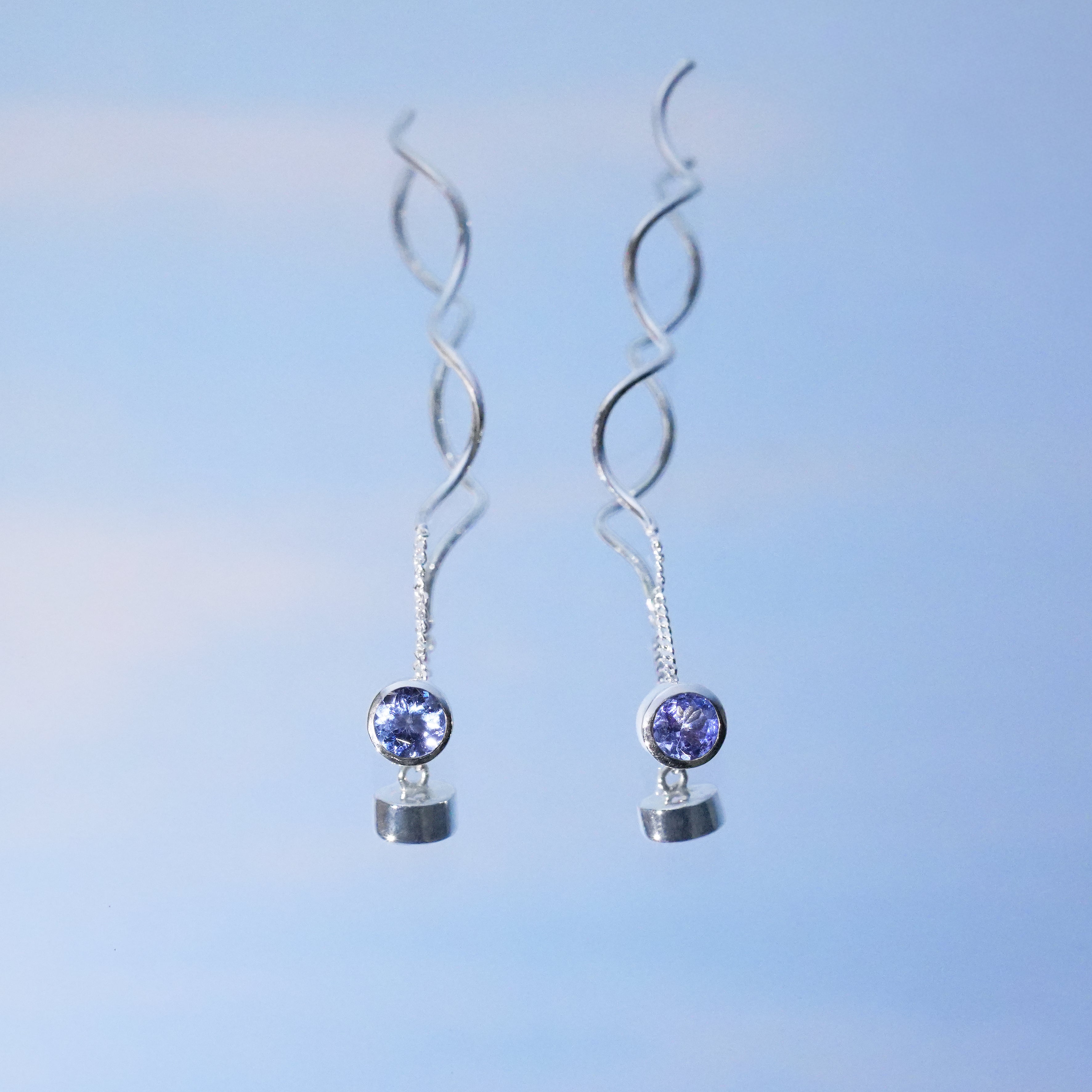 Starborn Faceted Tanzanite Stud Earrings with Flowing Curled Wire Drop in Sterling Silver