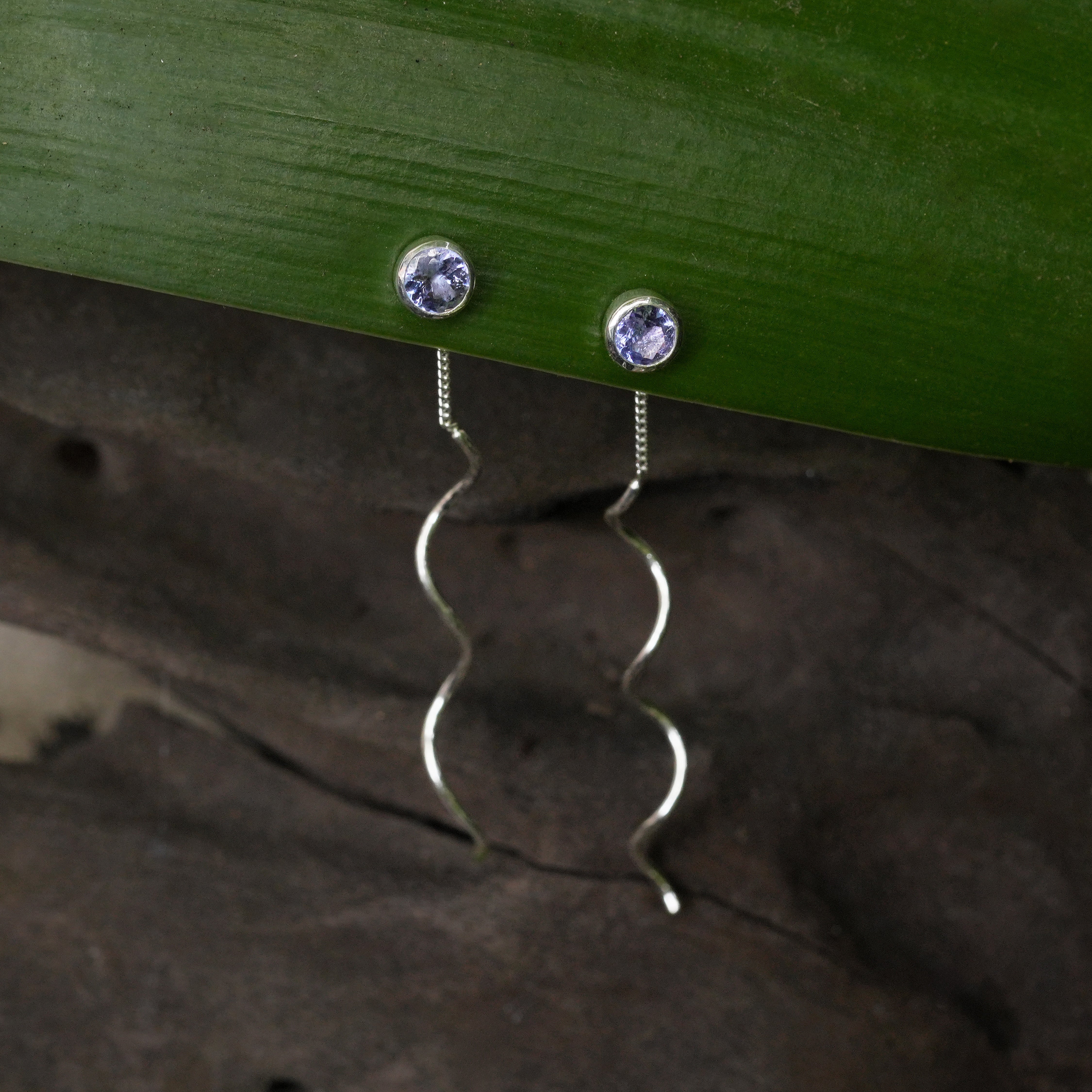 Starborn Faceted Tanzanite Stud Earrings with Flowing Curled Wire Drop in Sterling Silver