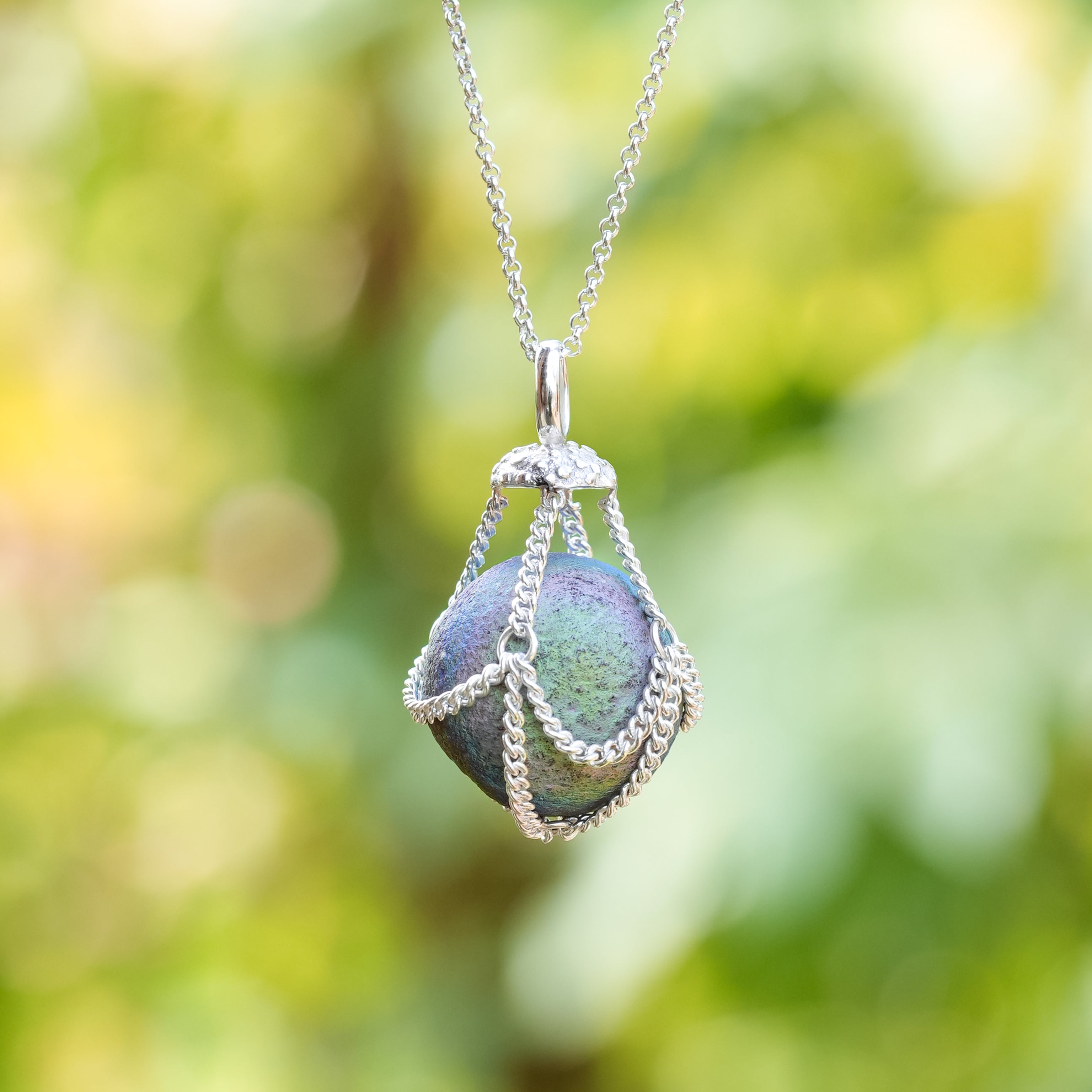 Starborn Unicorn Chalcedony Sphere Chain Basket Pendant in Sterling Silver