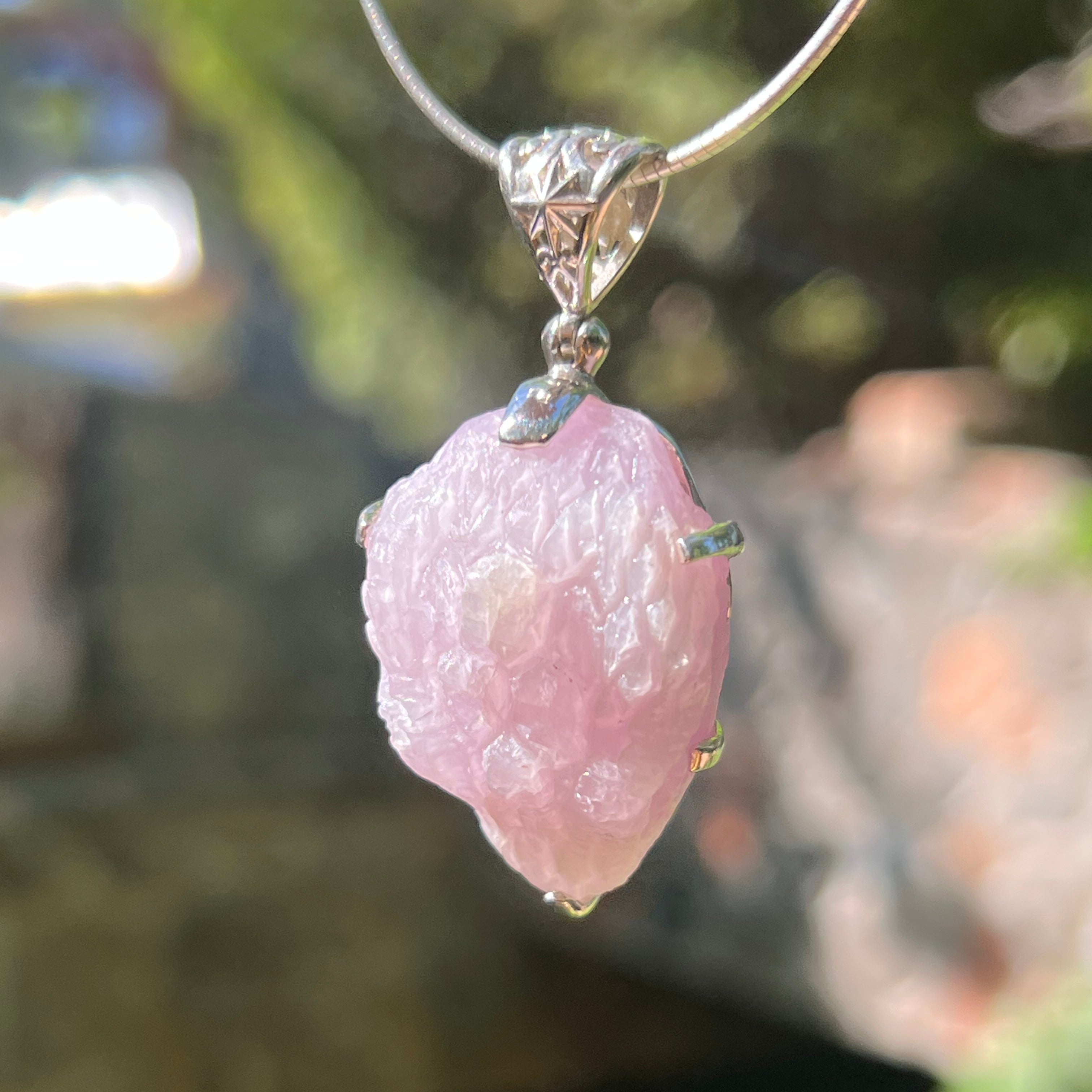 Starborn Carved Kunzite Snake Head Pendant in Sterling Silver