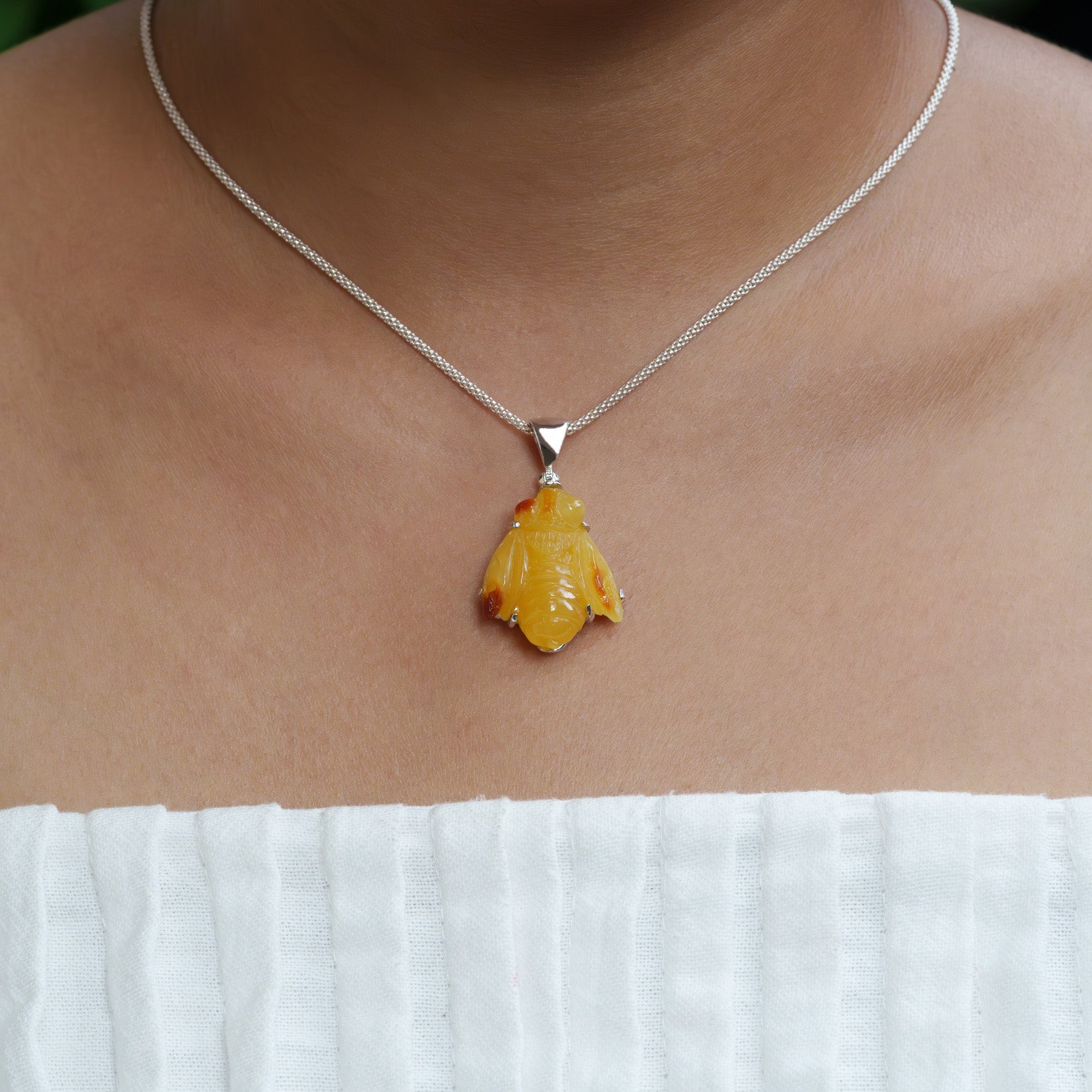 Starborn Hand-Carved Baltic Amber Bee Pendant in Sterling Silver