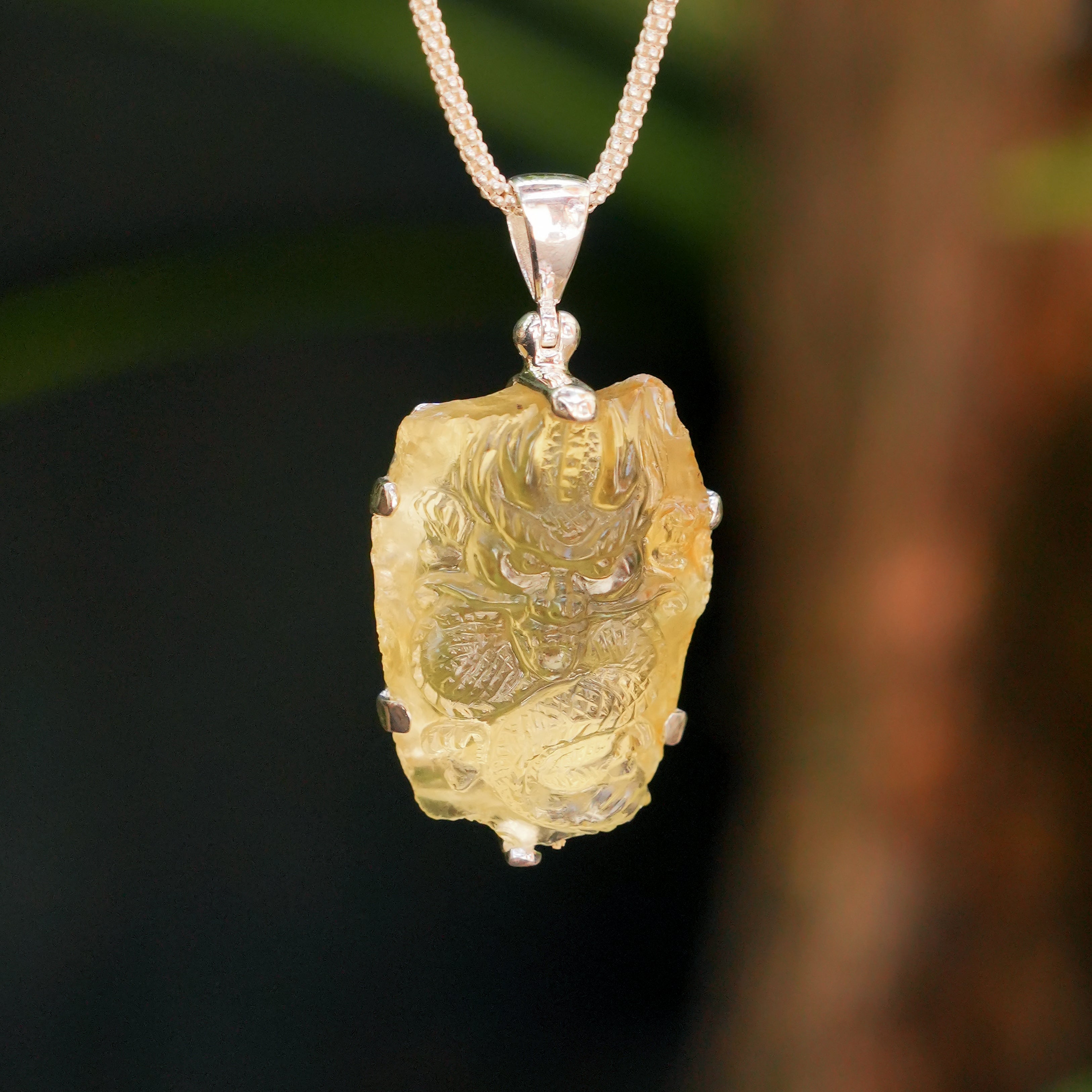 Starborn Heliodor Dragon Carving Pendant in Sterling Silver