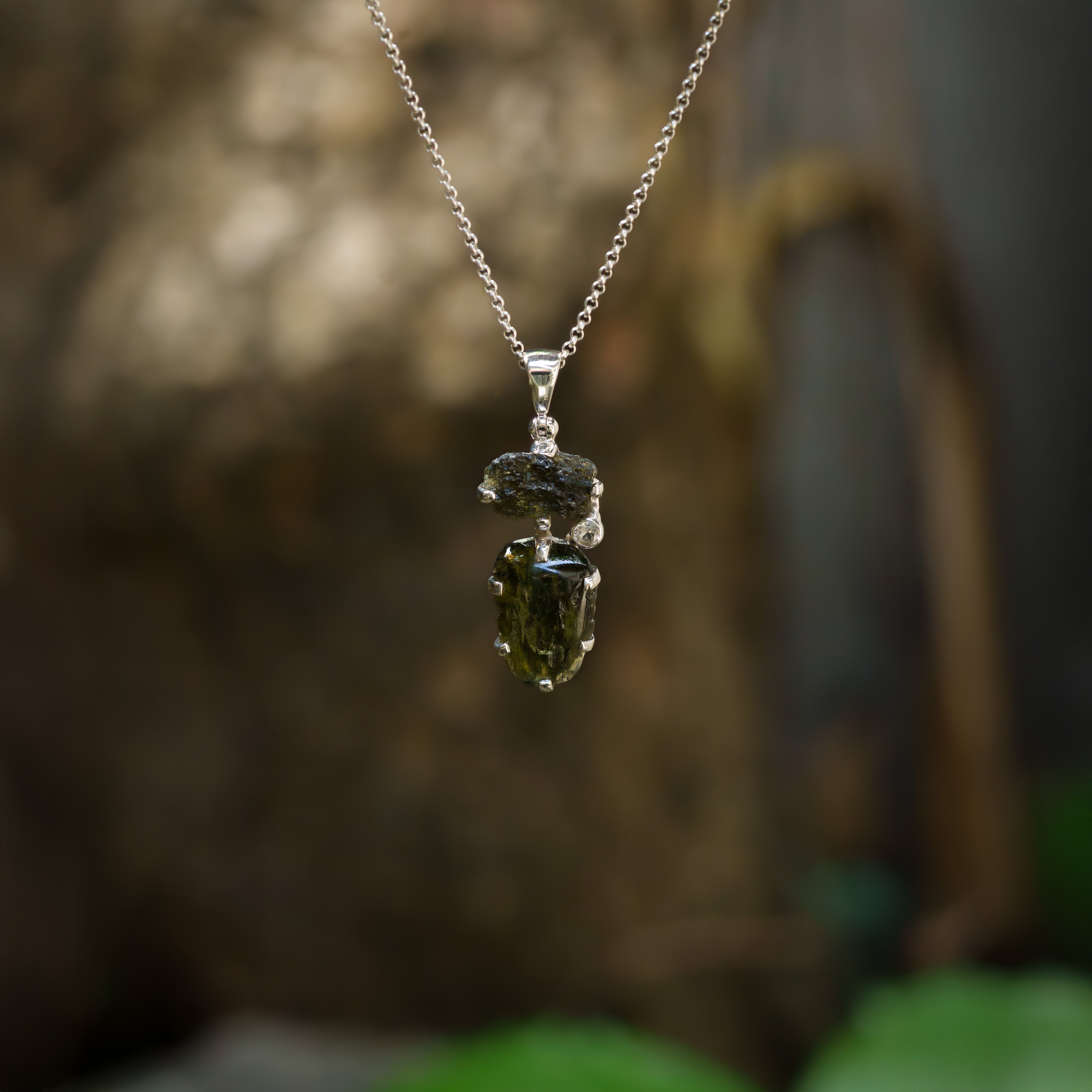 Starborn Moldavite Prong-Set Pendant with White Topaz Accent in Sterling Silver
