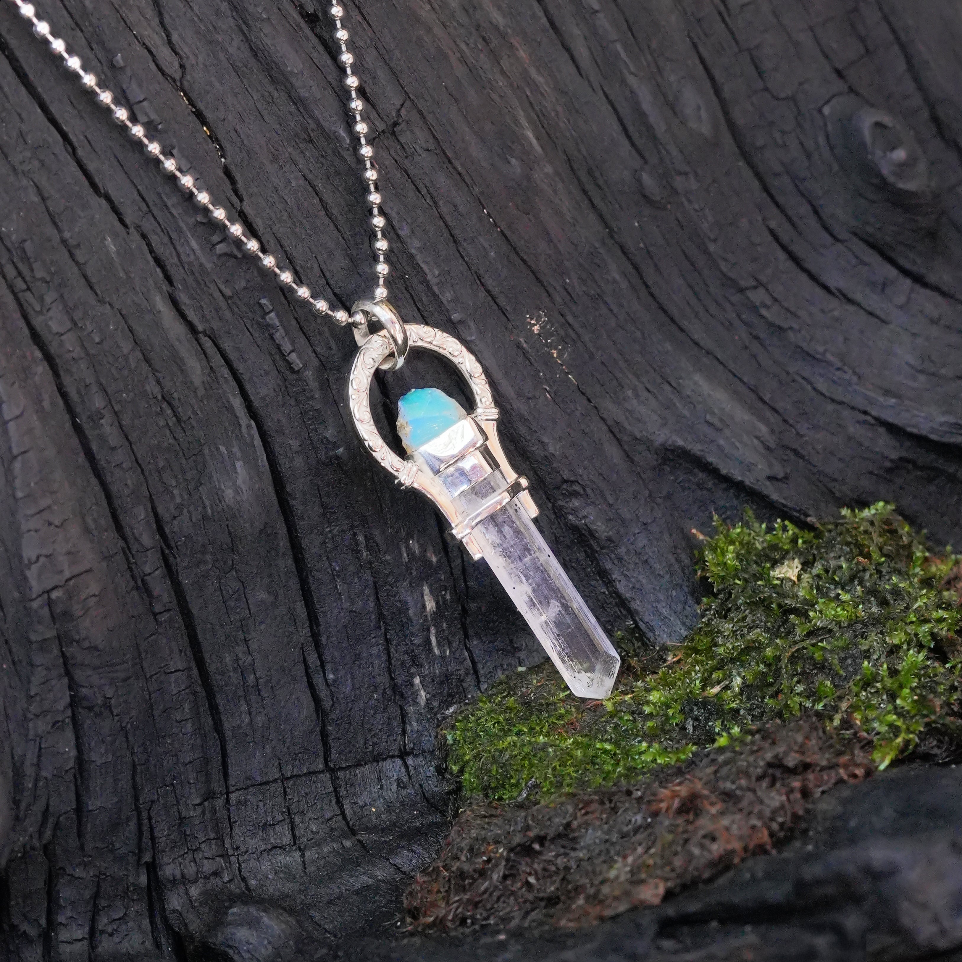 Starborn Danburite Crystal + Ethiopian Opal Horseshoe Pendant in Sterling Silver