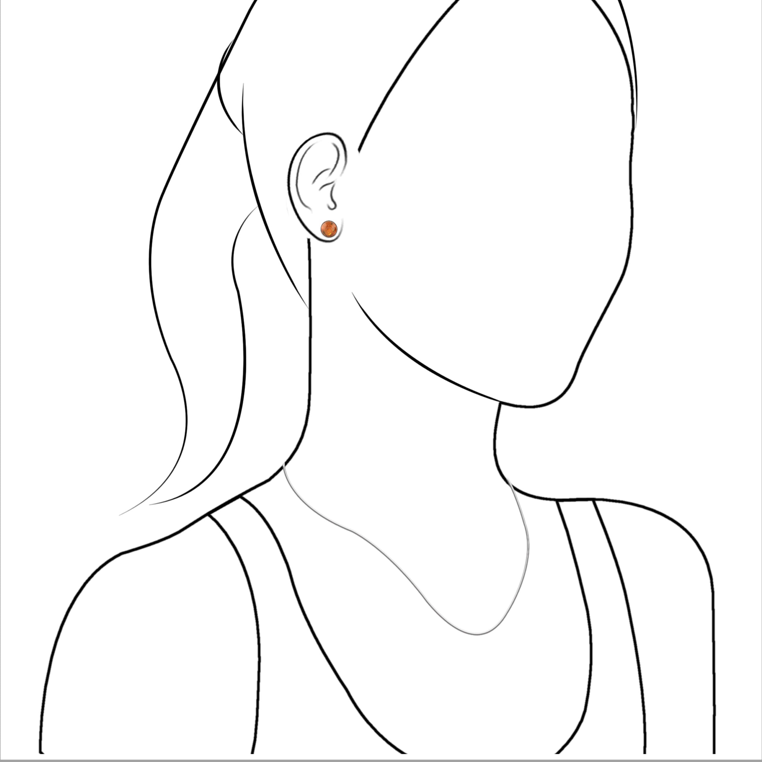 Illustration of a women wearing the round Baltic amber silver stud earrings for size reference.
