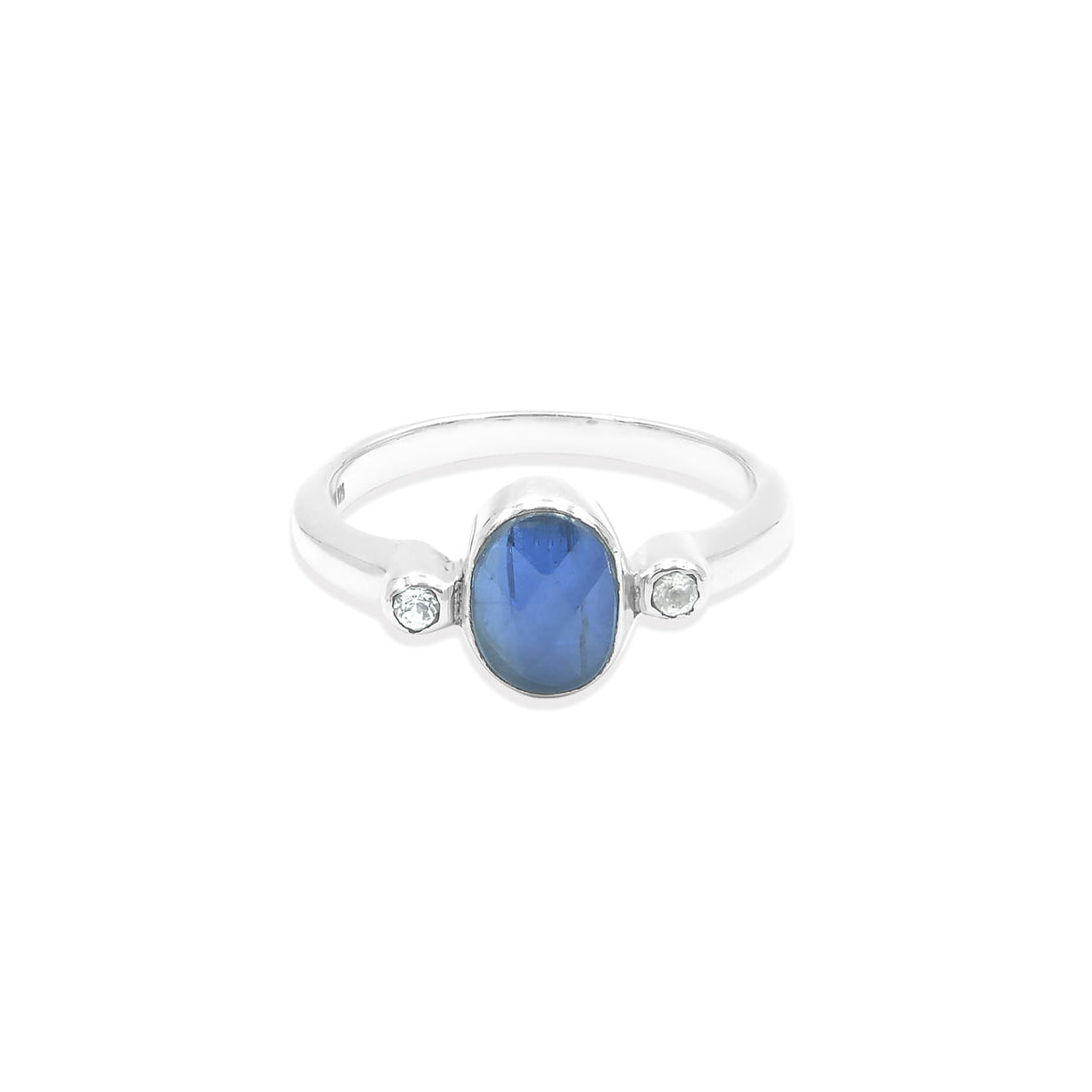Second front‑facing view of the same ring, displaying the oval faceted kyanite centered on a slim sterling silver band with a small round topaz accent.